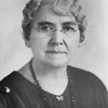 <em>Louise McKinney, first woman elected to the Legislative Assembly of Alberta</em><BR />Title: Portrait of Louise McKinney<BR />Object Number: A3459<BR />Notes: Portrait of Louise McKinney, first woman elected to the Alberta legislature and member of the Famous Five.<BR />Date: [after 1917]
