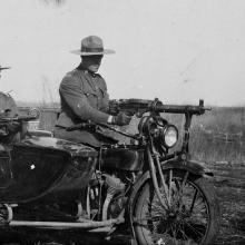 View of the Drunmeller police motorcycle and side car used during labour disputes. Policemen unidentified. Date: [between 1923 and 1924]. <BR />Photo A4814